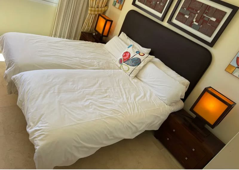 The same bedroom in a dim phone snapshot