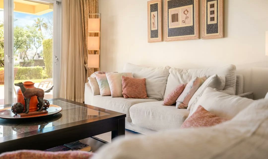 Living room photographed by Troyan with garden light through the windows