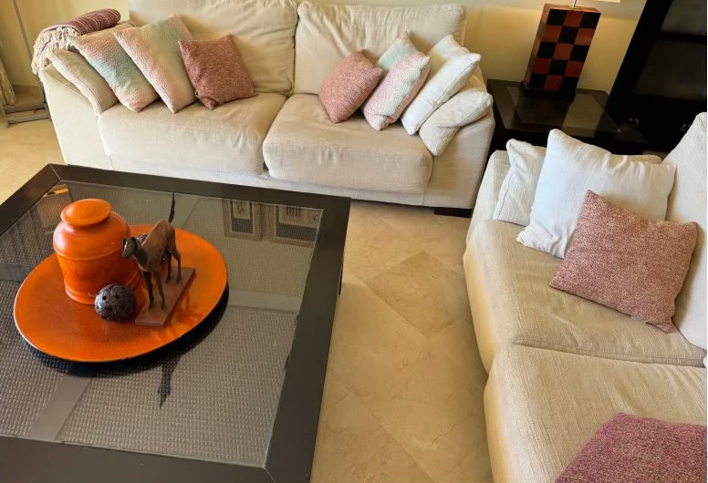 The same living room in a cramped phone snapshot