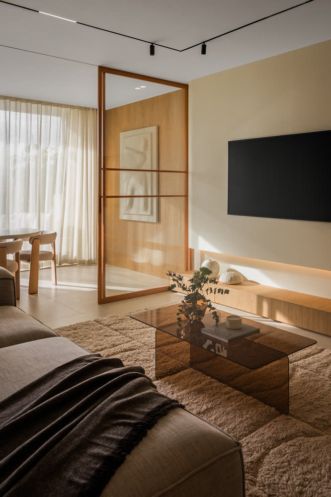 Warm living room with an oak and glass partition