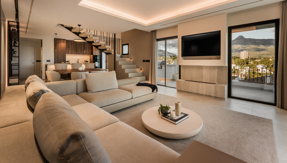 Living room with a recessed ceiling and low furniture
